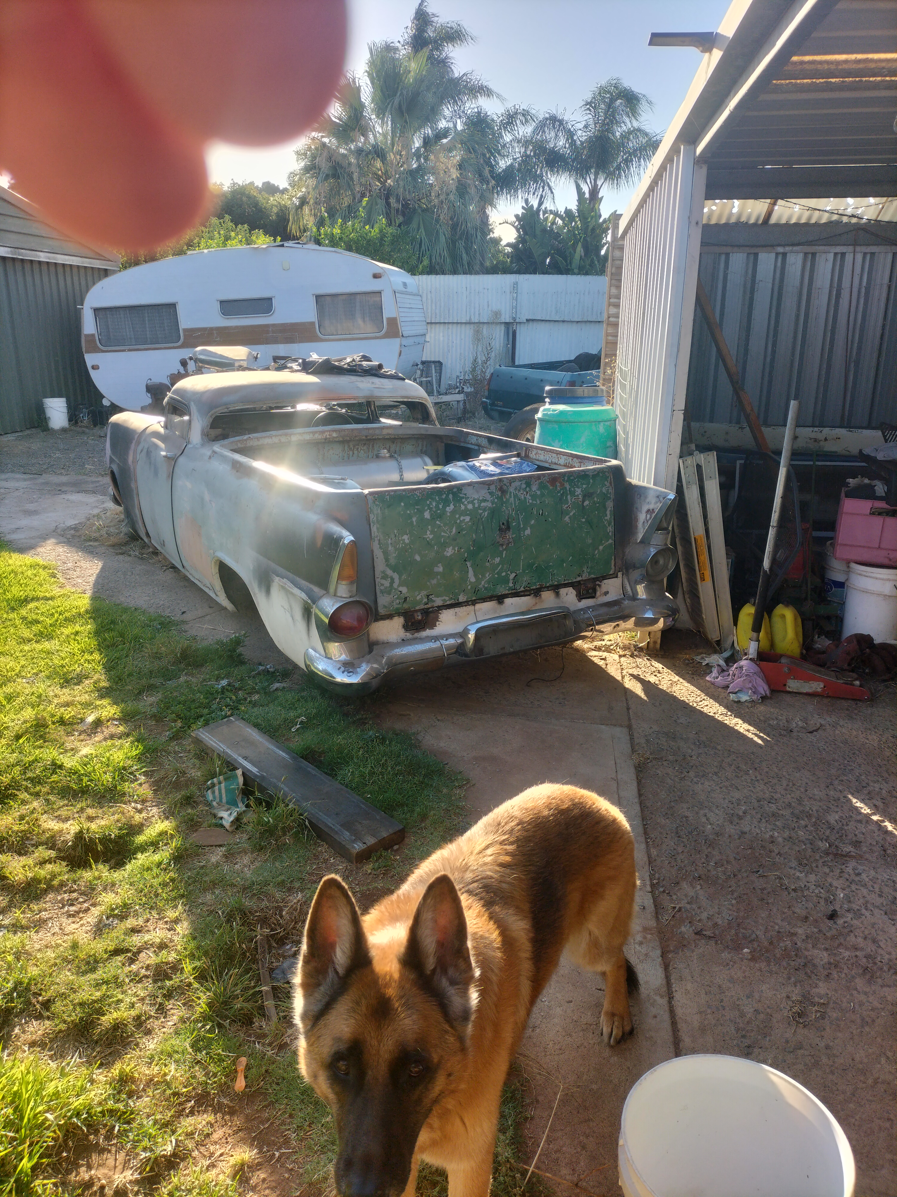 Push out into the 40 degree day to work on other cars