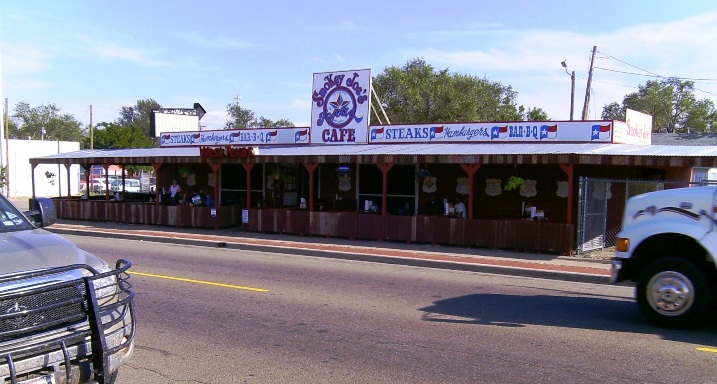 On old Rt 66. Like a place in a movie- huge steaks, hambugers, the best chips and Texas' favorite beer 'Shiner Bock' which is excellent. All served by good looking ladies in short shorts &amp; singlets! Juke boxes, no.plates and all sorts of interesting stuff inside. Hot rods, classic &amp; harleys flock here on weekends - Yee hah!